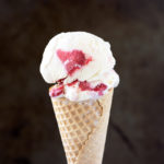 Ice cream cone with one scoop if ice cream