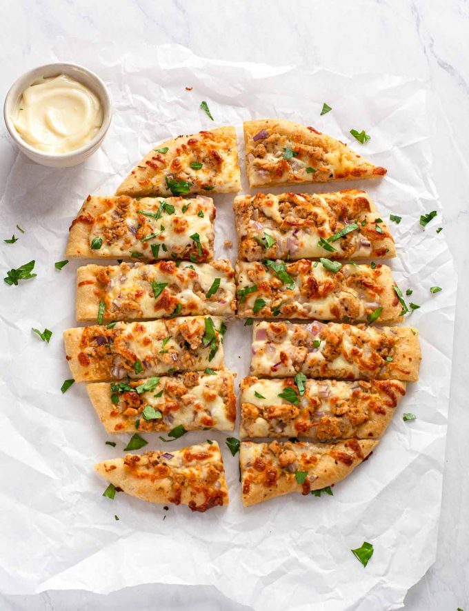 Round pizza, cut into rectangular fingers, slightly separated from each other