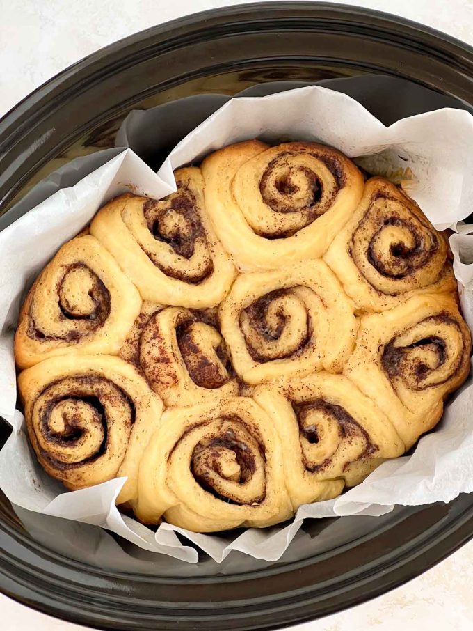 ten fully-cooked cinnamon rolls in a slow cooker.