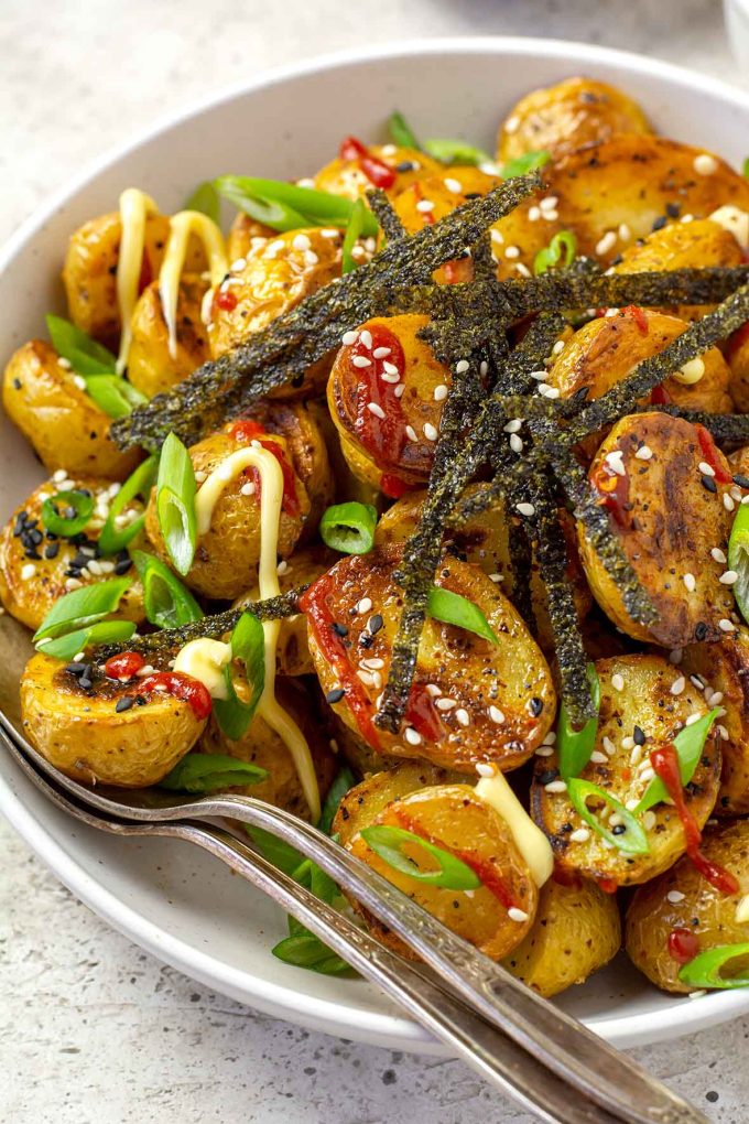 Close up shot of bowl of roasted Togarashi potatoes.